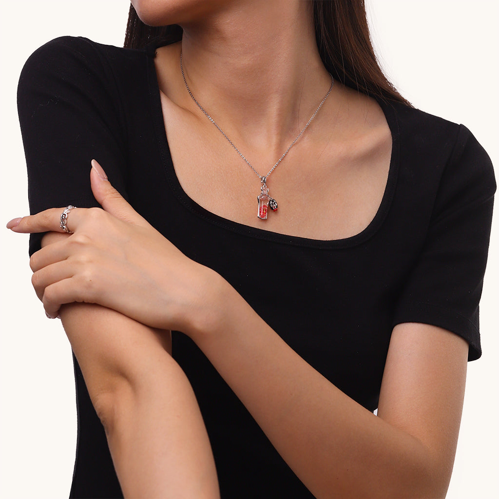 Gnoce Saw Billy the Puppet Glow-in-the-Dark Glass Potion Pendant Dangle Charm_6